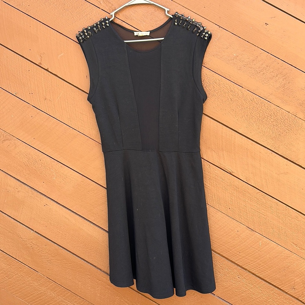 Black Party Dress Bodice Black with tiny mesh pieces down the middle to waist.